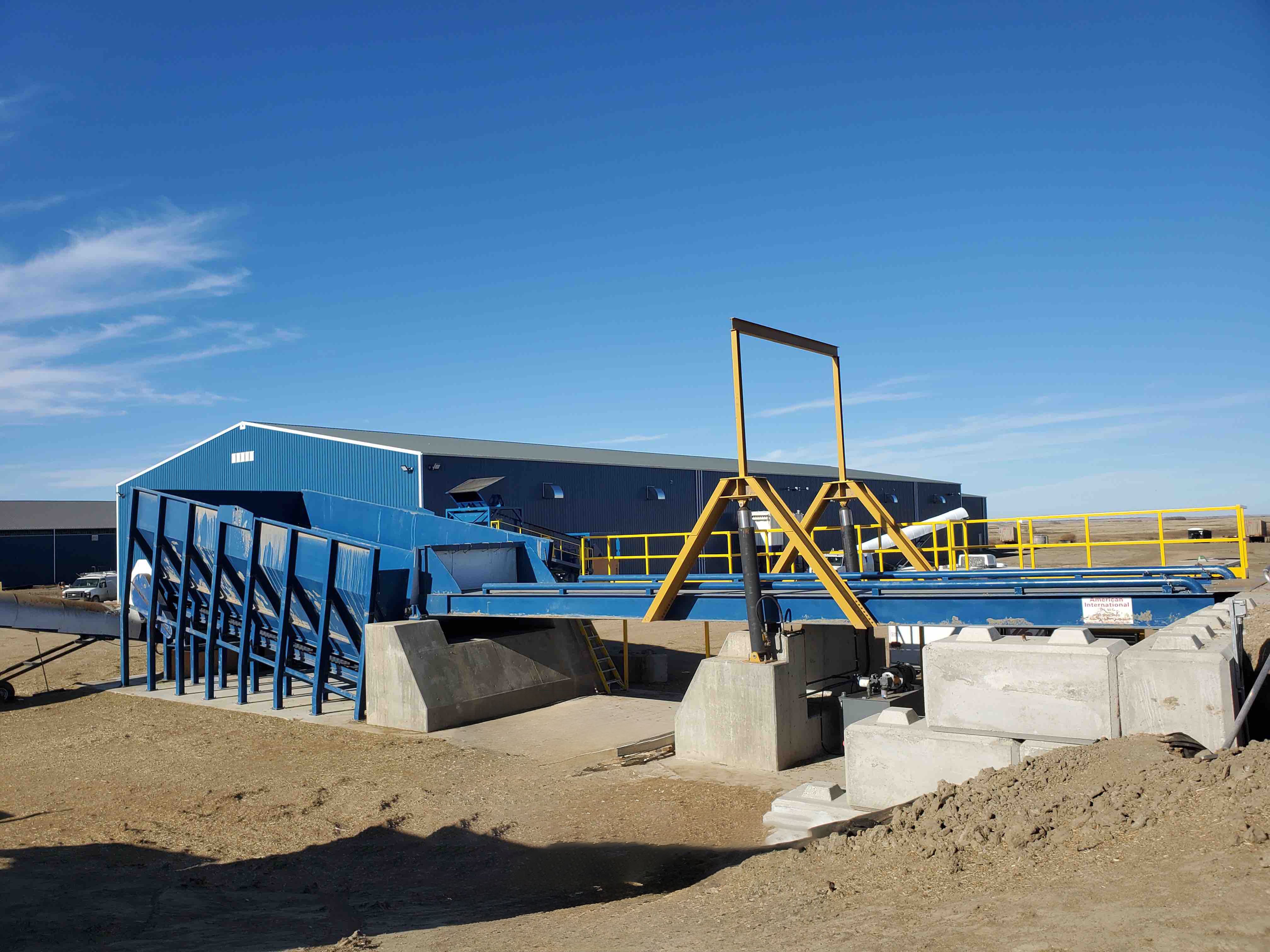 Used American International Used Dumper with Hopper and Control System